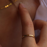 Band with beaded edges