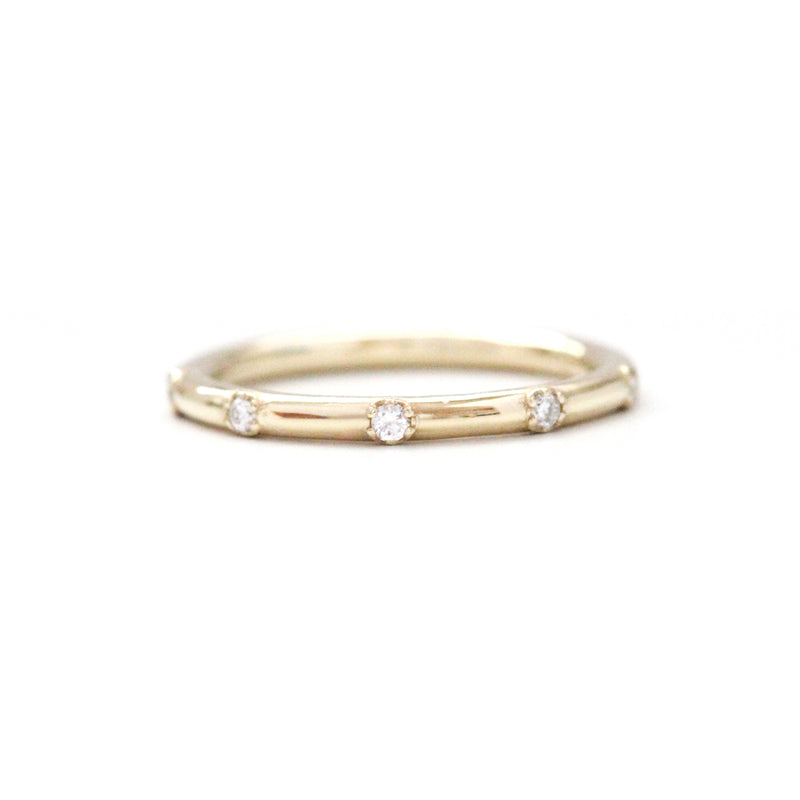 5 stone diamond prong set rounded band