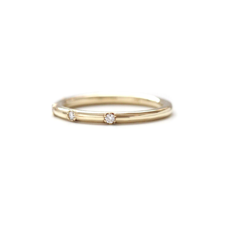 5 stone diamond prong set rounded band