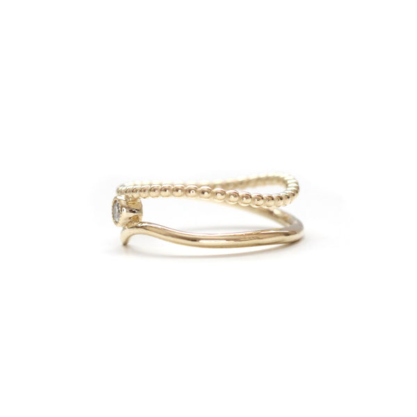 Beaded diamond milgrain bezel bypass ring