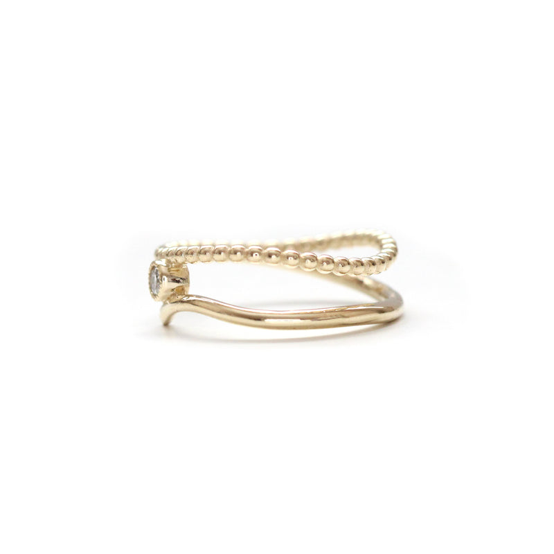 Beaded diamond milgrain bezel bypass ring