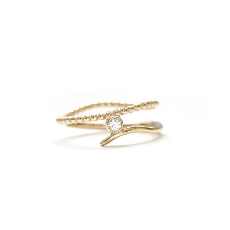Beaded diamond milgrain bezel bypass ring