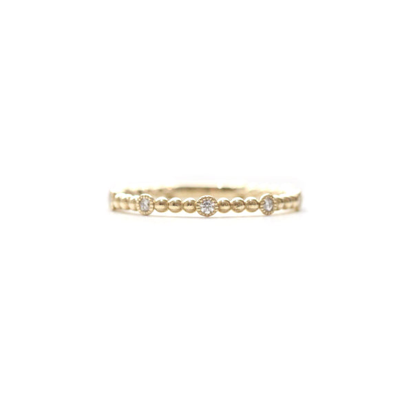 Alternating round milgrain bezel diamond and beaded band