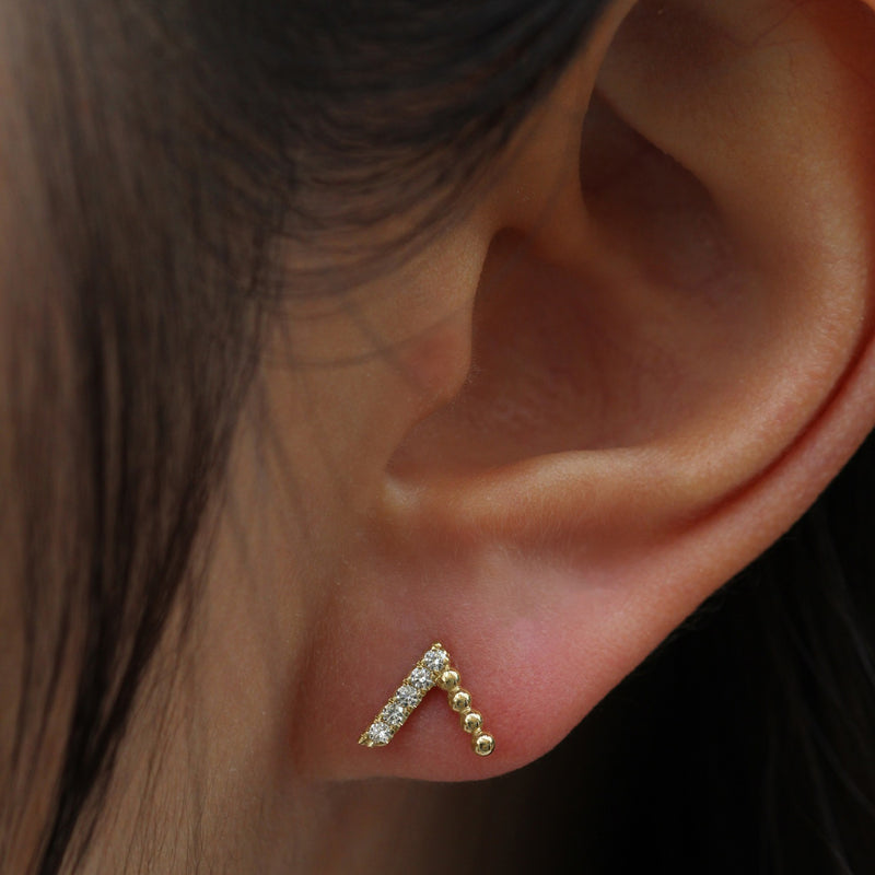 V beaded diamond earrings